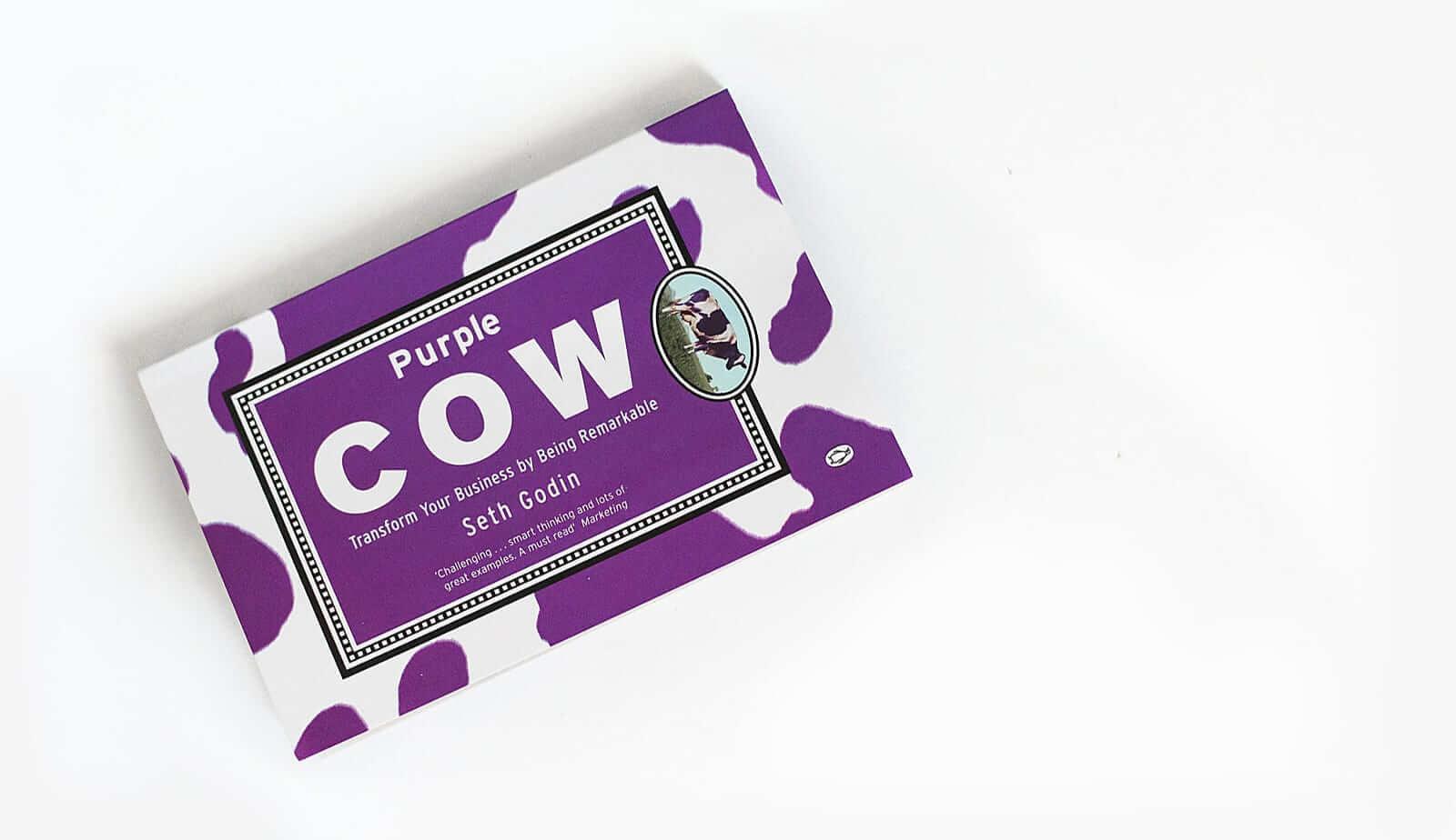 book cover of Seth Godin's book "Purple Cow"