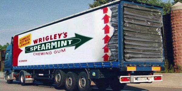 A semi truck designed to look like a pack of Wrigley's Spearmint Chewing Gum.